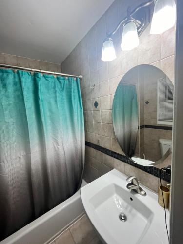 a bathroom with a sink and a mirror at LifeTyme Homes 