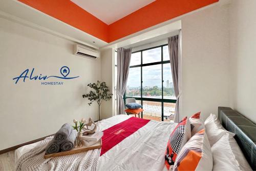 a bedroom with a bed with an orange ceiling at Costa Mahkota - 1min I Mahkota Parade Mall I Dataran Pahlawan I Mahkota Hospital in Melaka