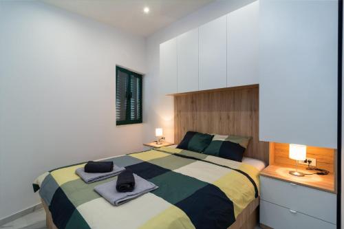 Ένα ή περισσότερα κρεβάτια σε δωμάτιο στο Apartman Katarina