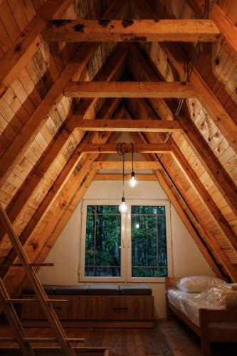 Ένα ή περισσότερα κρεβάτια σε δωμάτιο στο STANET Forest Houses