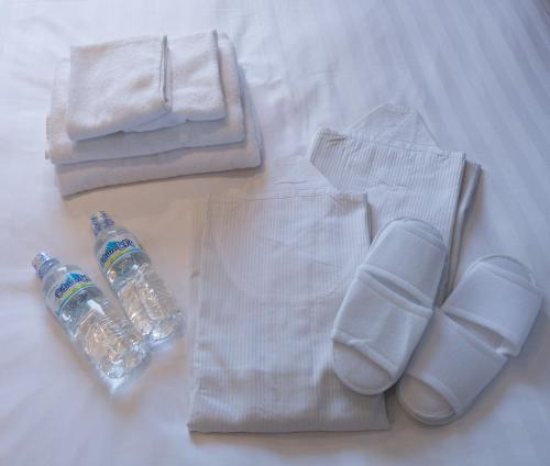 Postel nebo postele na pokoji v ubytování E Hotel Higashi Shinjuku