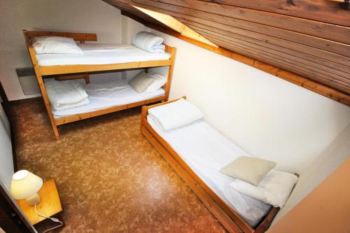 Poschodová posteľ alebo postele v izbe v ubytovaní Résidence Le Grand Vallon - 3 Pièces pour 6 Personnes 831