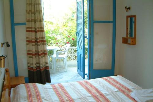 Ένα ή περισσότερα κρεβάτια σε δωμάτιο στο Guesthouse Karidia