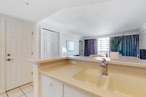 a kitchen with a sink and a counter top at Daytona Beach Resort 1216 in Daytona Beach