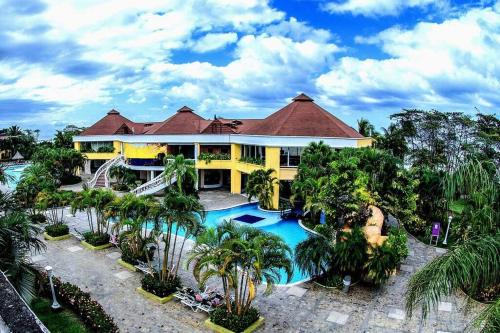 an aerial view of a house with a swimming pool at A little piece of paradise! in Juticalpa