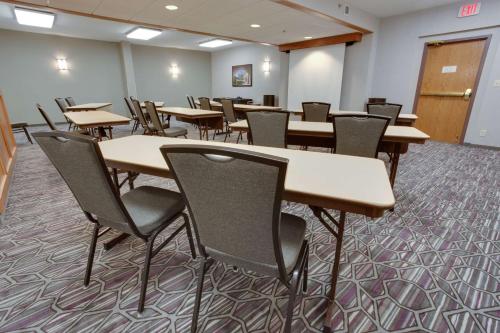 a classroom with tables and chairs in a room at Drury Plaza Hotel San Antonio Airport in San Antonio