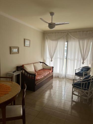 Χώρος καθιστικού στο Espaço tranquilo e de lazer em Guarujá