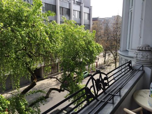 a bench sitting on the side of a building at Hotel Astrid am Kurfürstendamm in Berlin