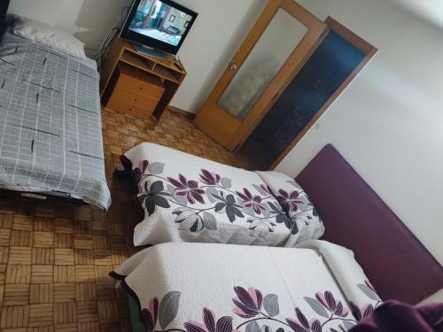 Ein Bett oder Betten in einem Zimmer der Unterkunft Coslada parque blanco