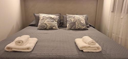 Säng eller sängar i ett rum på Baireshistorico