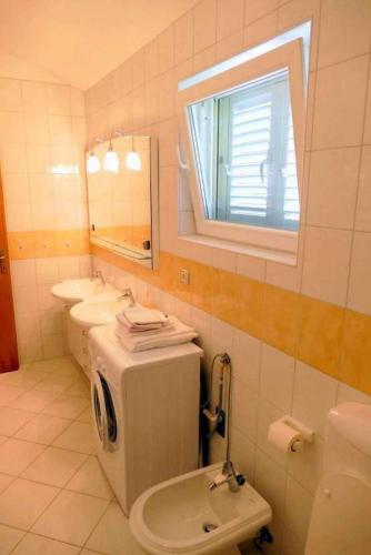 Apartments with parking space Palit, Rab - 22562