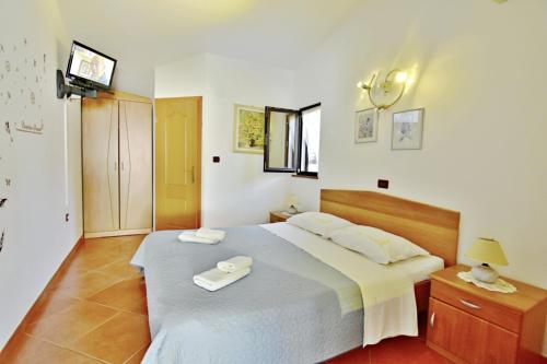 Apartments with parking space Umag - 22565