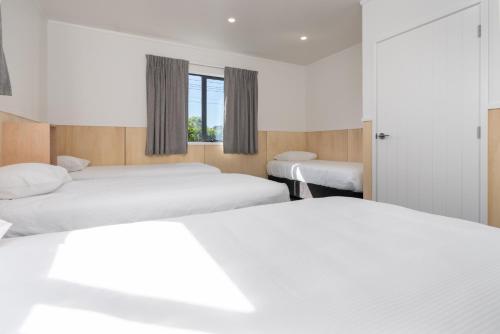 Letto o letti in una camera di Cambridge Top 10 Holiday Park