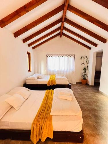 Ένα ή περισσότερα κρεβάτια σε δωμάτιο στο Casa campestre Hotel Turquesa