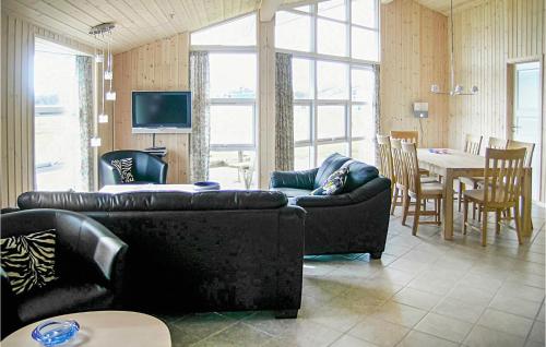 Posezení v ubytování Holiday Home Morgenfruevænget