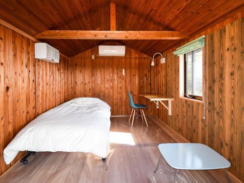 Un pat sau paturi într-o cameră la Tonosaki Bungalow & BBQ - Vacation STAY 34299v
