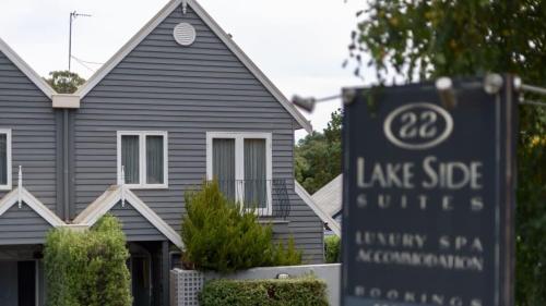 a house with a lake side sign in front of it at Lakeside Suite 4 - Lake View & Spa Bath in Daylesford