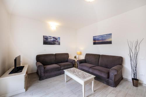 Гостиная зона в Casa al Ponte dei Marmi - few KM to sea - Happy Rentals