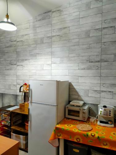 Kuchyň nebo kuchyňský kout v ubytování Casa Vacanze LIBECCIO Free private parking