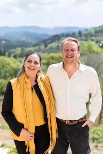 a man and a woman standing next to each other at Domaine de la Cascade Parfumée in Grasse