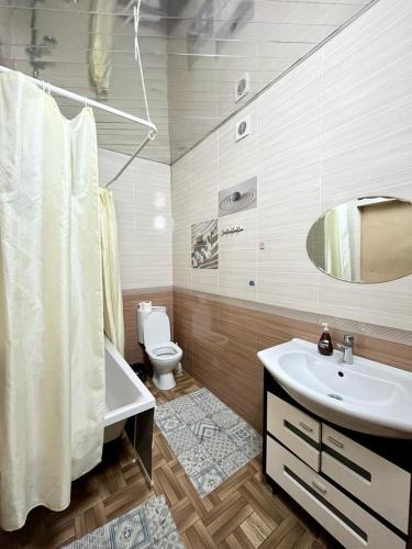 Ванная комната в Апартаменты в ЖК Коркем 709