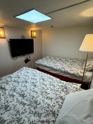 Ένα ή περισσότερα κρεβάτια σε δωμάτιο στο G Mini Hotel Dongdaemun