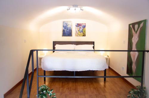 Säng eller sängar i ett rum på Dali Home
