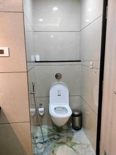 Un baño de Hotel Dolphin Grand