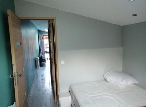 En eller flere senge i et værelse på Studio 24m2
