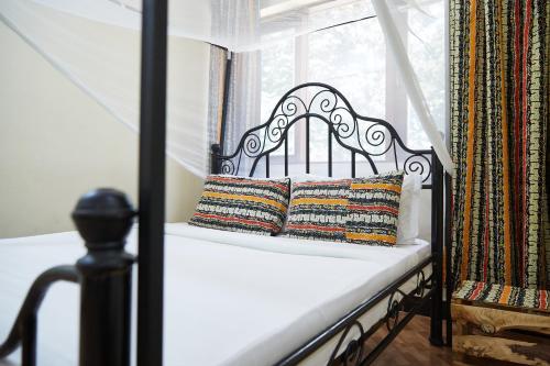 Villa Viva Tanzaniaにあるベッド