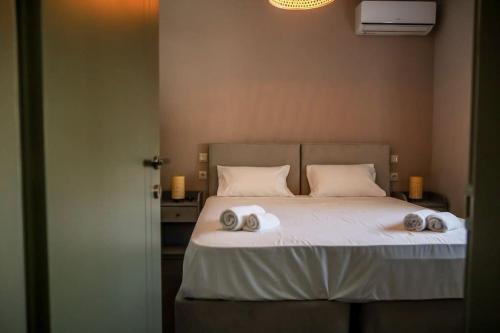 Ένα ή περισσότερα κρεβάτια σε δωμάτιο στο Exquisite Apartment for 4 people in the city central