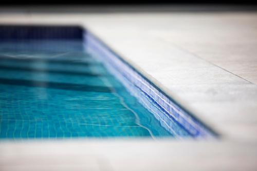 a close up of a swimming pool at Hotel SB Win in Sant Feliu de Llobregat