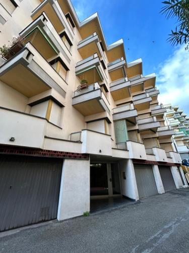 a building with balconies on the side of it at Escape Express by PortofinoVacanze in Rapallo