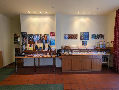 Kuchyň nebo kuchyňský kout v ubytování ACRON Hotel Wittenberg