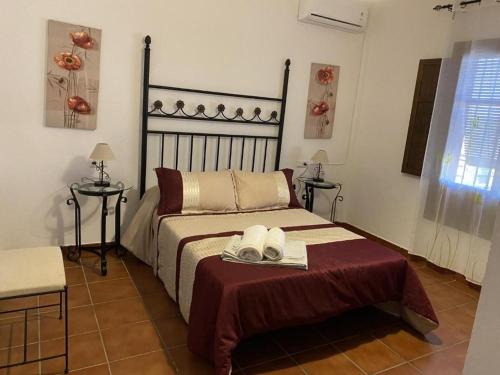 Postel nebo postele na pokoji v ubytování Finca olivar el pino