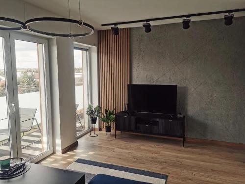Μια τηλεόραση ή/και κέντρο ψυχαγωγίας στο Loft przy Wiśniowej