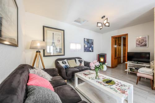 TV a/nebo společenská místnost v ubytování Casa La Parra