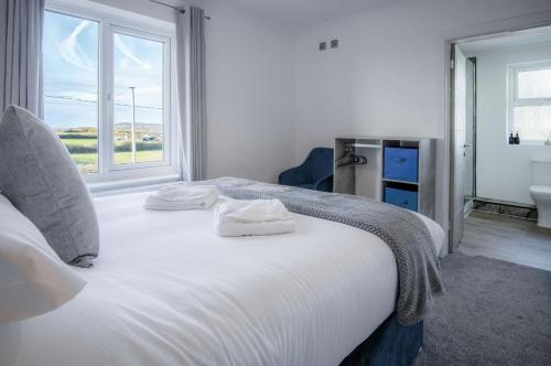 Postel nebo postele na pokoji v ubytování Vista Suite - 3 Bed Apartment - Ocean Breeze
