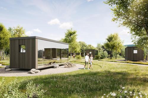 a rendering of a tiny house in a field at Neugrad STYLE - 2er Cabins in Schleiden