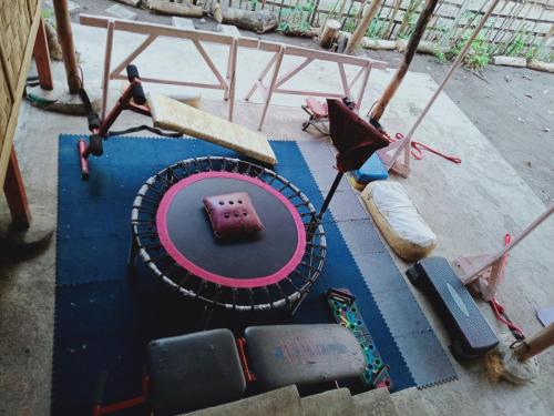 an aerial view of a merry go round on a playground at JUNGLE GYM LA UNION Prana fan kubo 2 pax in Rimus