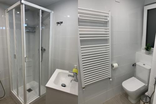 a bathroom with a shower and a sink and a toilet at Casa José Morella in Morella