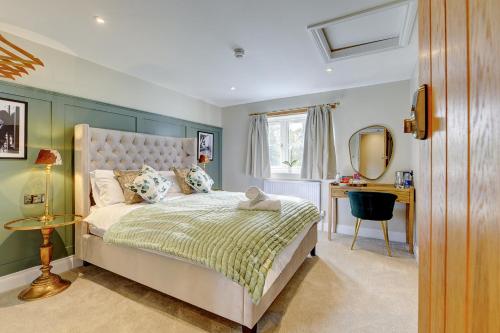 Ένα ή περισσότερα κρεβάτια σε δωμάτιο στο The Bridge House Henley