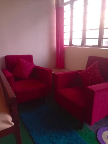 Ein Sitzbereich in der Unterkunft Aakeet Lyang Homestay