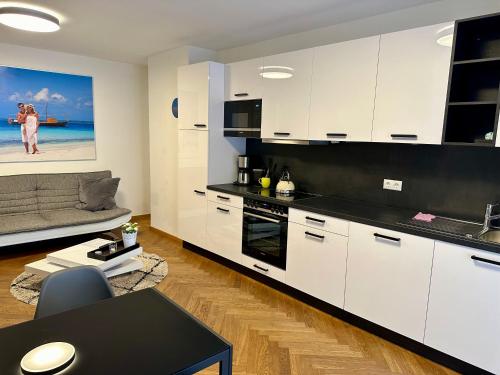 Kuchyň nebo kuchyňský kout v ubytování Exklusives Apartment mit einmaligem Blick zur Frauenkirche - Parkplatz kostenfrei