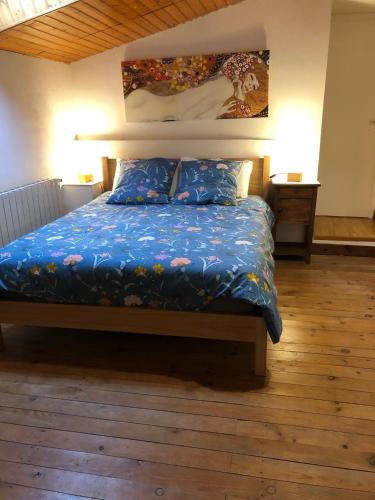 Ein Bett oder Betten in einem Zimmer der Unterkunft Gite Bacchus