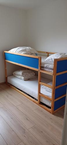 a couple of bunk beds in a room at North beach in Ostend