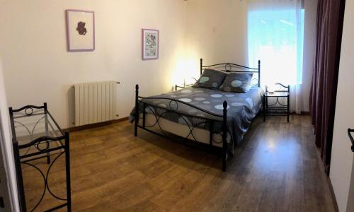Ein Bett oder Betten in einem Zimmer der Unterkunft Gite Bacchus