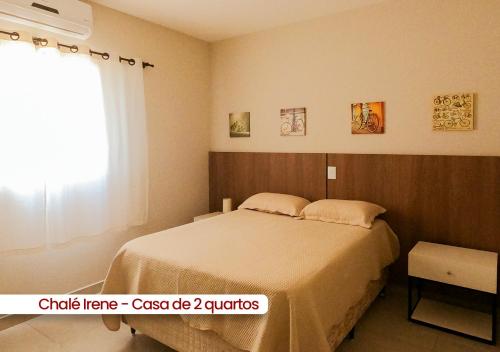Postel nebo postele na pokoji v ubytování Chalés Vila da Rosa