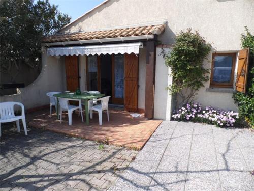 Maison mitoyenne 3 pièces avec terrasse, jardin clôturé et parking - 6 couchages à Marseillan - FR-1-326-484