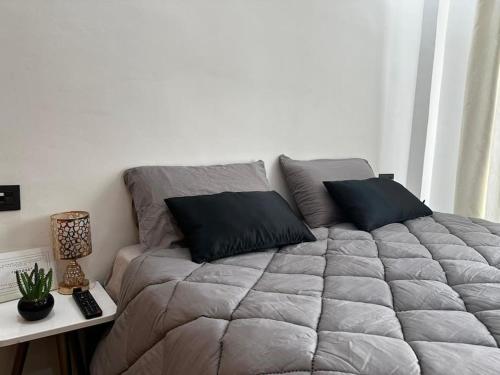 Postel nebo postele na pokoji v ubytování Appt Haut Standing - Agadir Bay